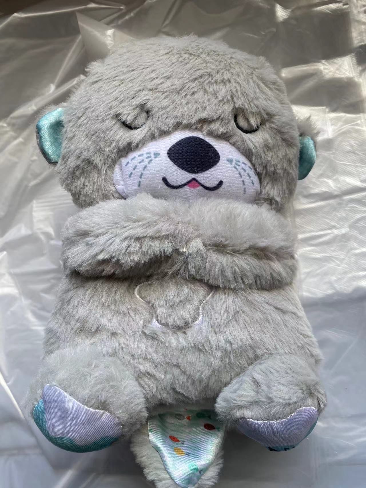 SleepNest Soothing Otter Plush Sound Machine portable travel comfort