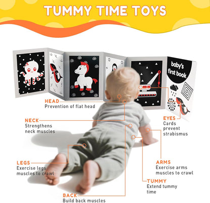 Baby laying on tummy with high contrast baby flash cards for infant learning.